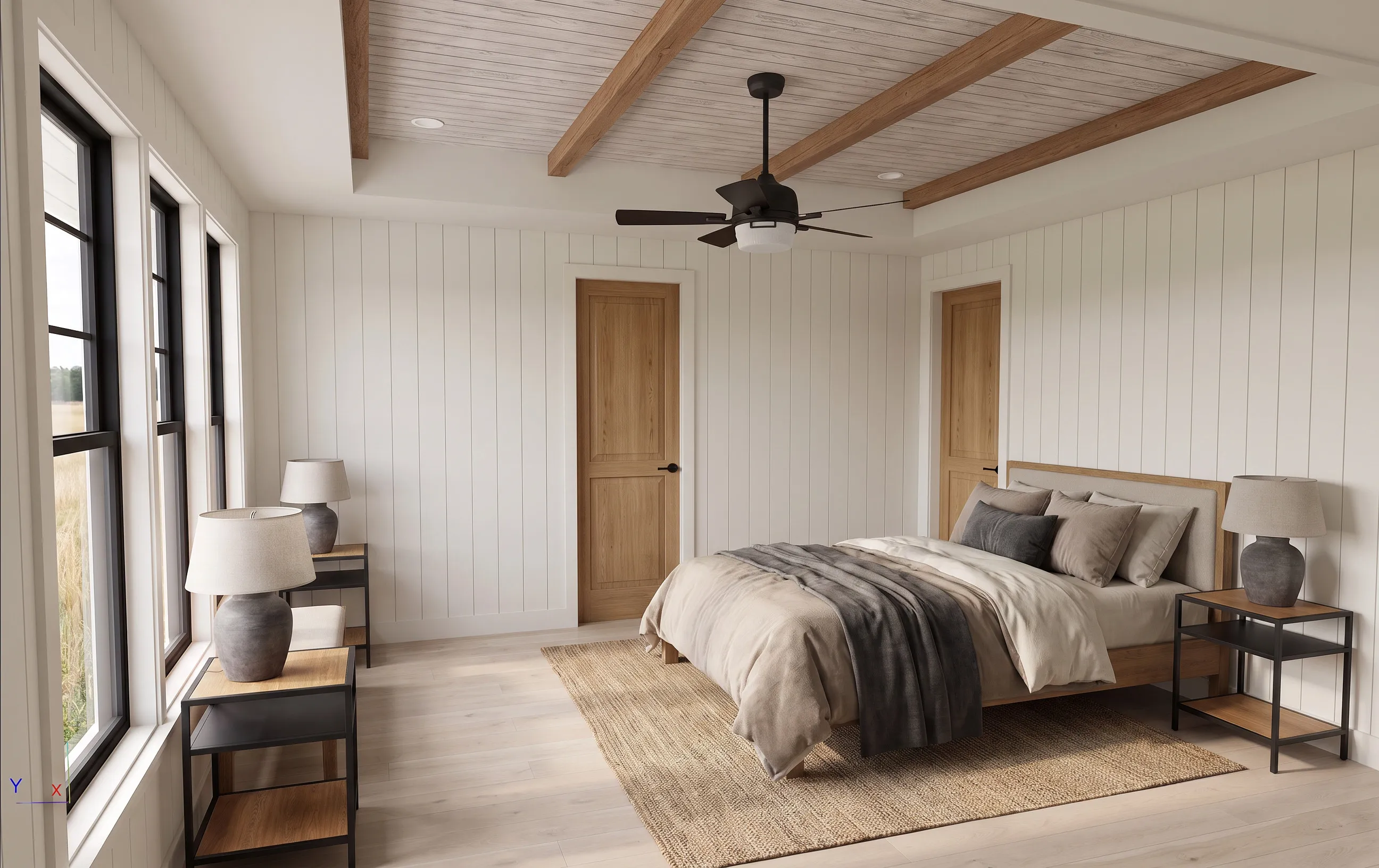 The primary bedroom of The Yonah — main level, with the bed on the long wall